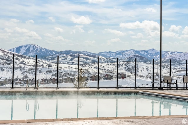 909 W Peace Tree Trl Unit 507, Heber City, UT 84032 - snow covered pool with a mountain view