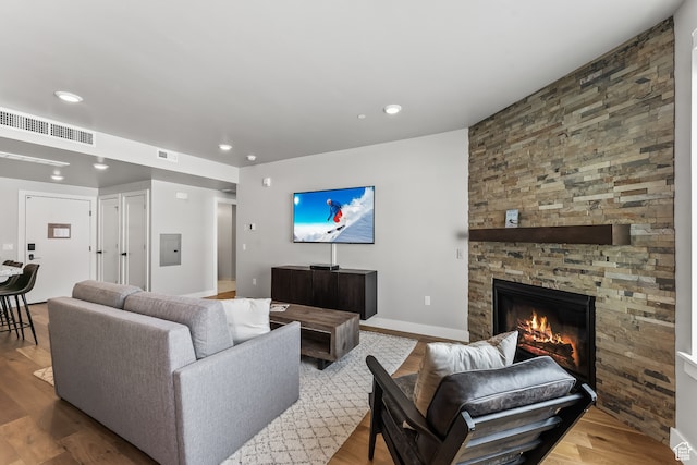 909 W Peace Tree Trl Unit 507, Heber City, UT 84032 - living room featuring light hardwood / wood-style floors and a stone fireplace