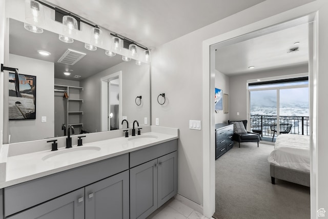 909 W Peace Tree Trl Unit 507, Heber City, UT 84032 - bathroom featuring double sink, oversized vanity, and a mountain view