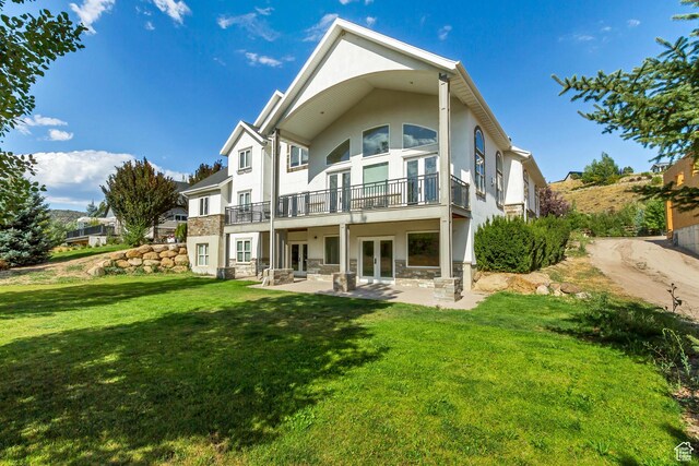 380 S Lindsay Spring Rd, Heber City, UT 84032 - rear view of property featuring french doors, a balcony, a yard, and a patio