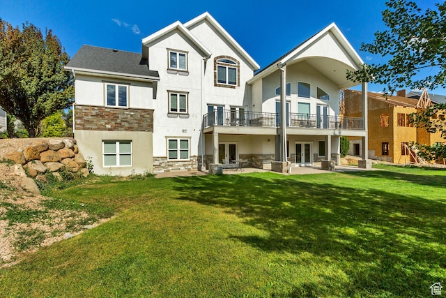 380 S Lindsay Spring Rd, Heber City, UT 84032 - back of property with a patio, a balcony, a lawn, and french doors