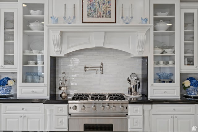 380 S Lindsay Spring Rd, Heber City, UT 84032 - kitchen featuring white cabinetry, backsplash, extractor fan, and high end stove