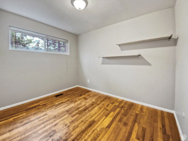 650 N 300 W Unit 218, Salt Lake City, UT 84103 - spare room featuring wood-type flooring