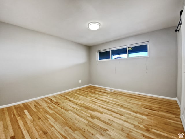 650 N 300 W Unit 218, Salt Lake City, UT 84103 - unfurnished room featuring light hardwood / wood-style flooring