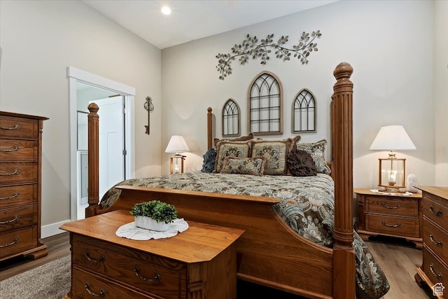 bedroom featuring dark hardwood / wood-style floors