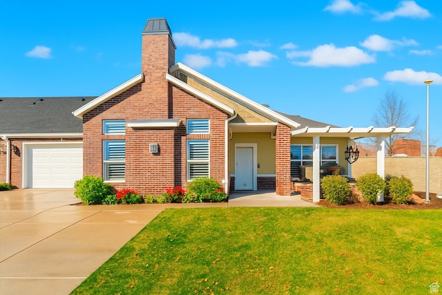 3274 W Harvest Chase Dr S Unit 202, South Jordan, UT 84095 - view of front of home with brick siding, a front lawn, driveway, and a chimney