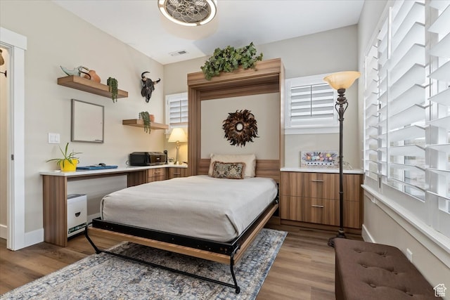 bedroom featuring hardwood / wood-style flooring