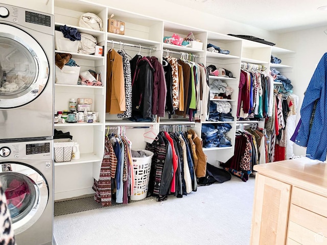 3213 N 4900 W, Malad City, ID 83252 - walk in closet with light carpet and stacked washer / drying machine