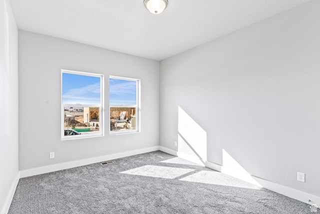 view of carpeted spare room