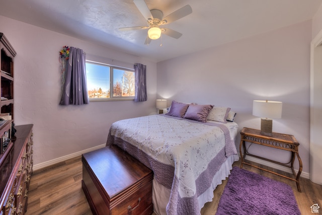 165 E 200 S, Monticello, UT 84535 - bedroom featuring ceiling fan and dark wood-type flooring