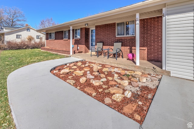 165 E 200 S, Monticello, UT 84535 - ranch-style home with a front lawn and a patio area