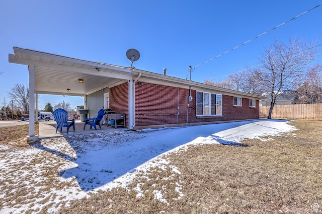 165 E 200 S, Monticello, UT 84535 - snow covered property with a patio