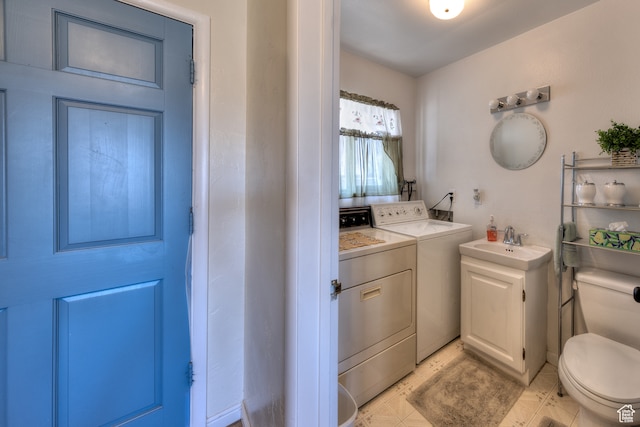 165 E 200 S, Monticello, UT 84535 - laundry area with independent washer and dryer, light tile floors, and sink