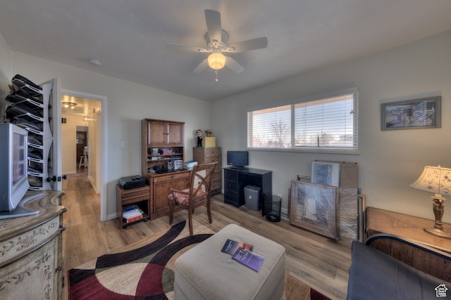 165 E 200 S, Monticello, UT 84535 - living room with ceiling fan and light wood-type flooring