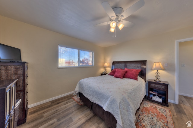 165 E 200 S, Monticello, UT 84535 - bedroom featuring ceiling fan and dark hardwood / wood-style flooring