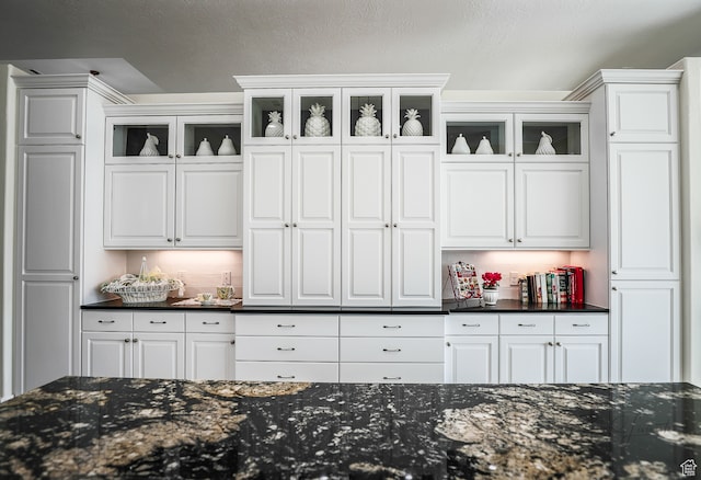 836 E St James Ln, St George, UT 84790 - interior space featuring dark stone countertops and white cabinets
