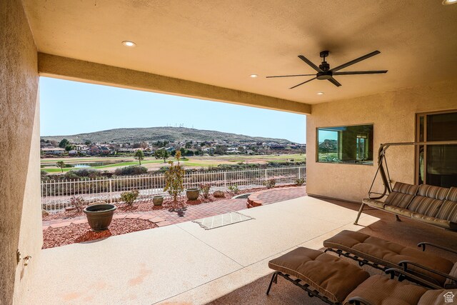 836 E St James Ln, St George, UT 84790 - view of patio with ceiling fan and a mountain view