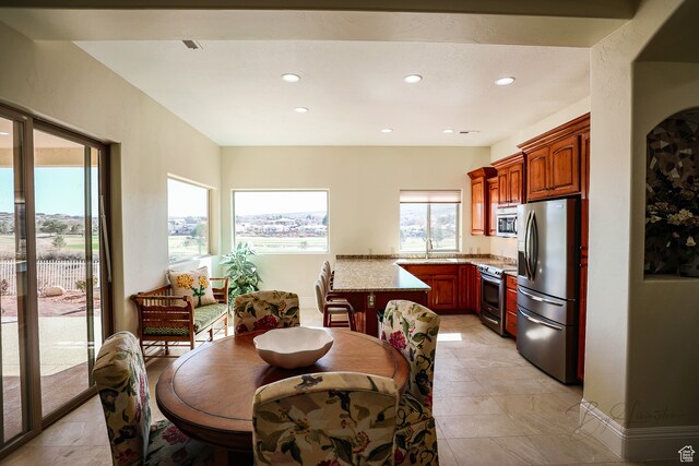 836 E St James Ln, St George, UT 84790 - dining room with sink and light tile floors