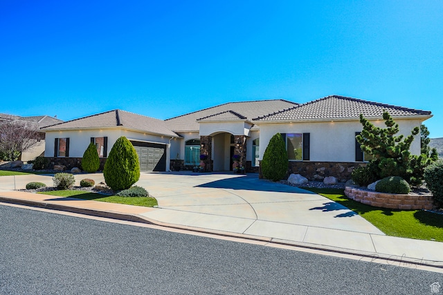 836 E St James Ln, St George, UT 84790 - mediterranean / spanish home featuring a garage