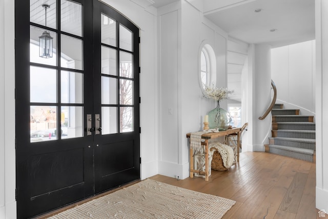 3297 W Blue Springs Ln, Bluffdale, UT 84065 - foyer with french doors and hardwood / wood-style flooring