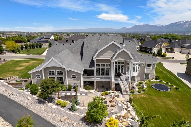 3297 W Blue Springs Ln, Bluffdale, UT 84065 - rear view of property with a lawn and a mountain view