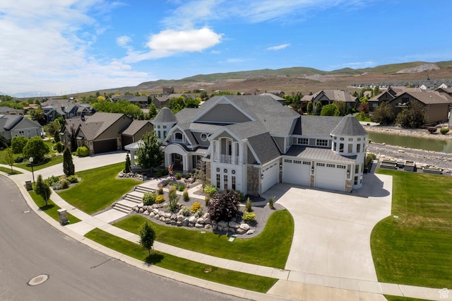 3297 W Blue Springs Ln, Bluffdale, UT 84065 - view of front of home featuring a mountain view and a garage
