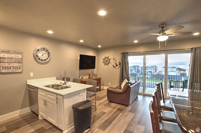 55 W Buttercup Ln Unit 26, Garden City, UT 84028 - kitchen featuring stainless steel dishwasher, ceiling fan, sink, dark hardwood / wood-style floors, and white cabinets