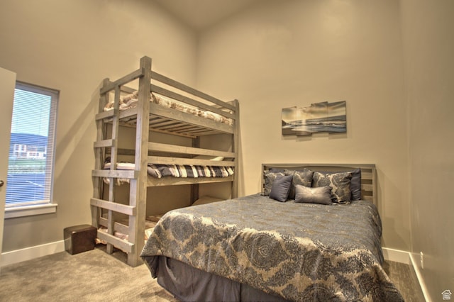 55 W Buttercup Ln Unit 26, Garden City, UT 84028 - bedroom with dark colored carpet