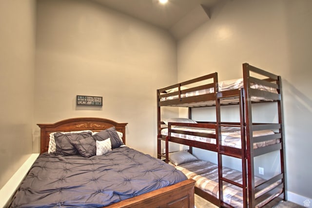 55 W Buttercup Ln Unit 26, Garden City, UT 84028 - carpeted bedroom with high vaulted ceiling