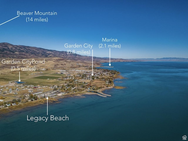 55 W Buttercup Ln Unit 26, Garden City, UT 84028 - drone / aerial view featuring a water and mountain view