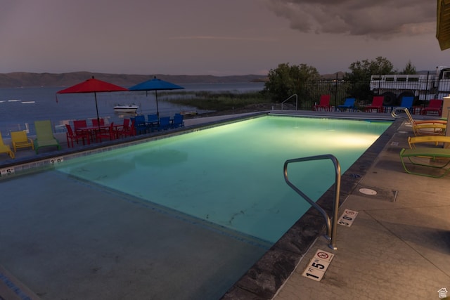 55 W Buttercup Ln Unit 26, Garden City, UT 84028 - view of pool at dusk
