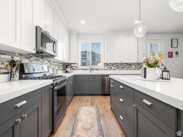 632 W 1460 S, Spanish Fork, UT 84660 - kitchen with tasteful backsplash, stainless steel appliances, and white cabinets