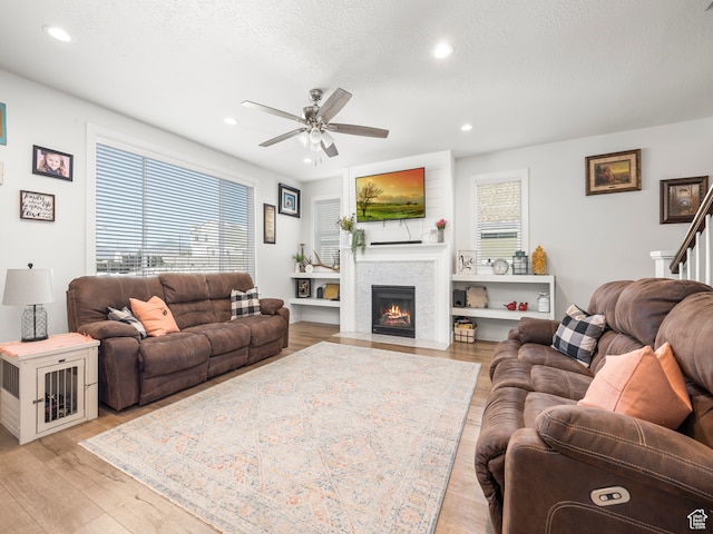 632 W 1460 S, Spanish Fork, UT 84660 - living room with plenty of natural light, a textured ceiling, ceiling fan, and light wood-type flooring
