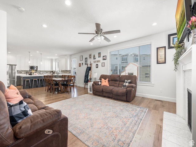 632 W 1460 S, Spanish Fork, UT 84660 - living room with ceiling fan and light wood-type flooring