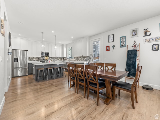632 W 1460 S, Spanish Fork, UT 84660 - dining area with light hardwood / wood-style flooring and sink