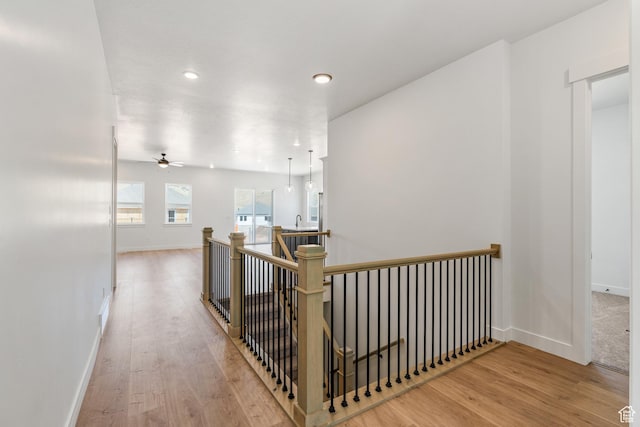 1260 Crest Dale Ln, Santaquin, UT 84655 - hall with baseboards, an upstairs landing, wood finished floors, and recessed lighting