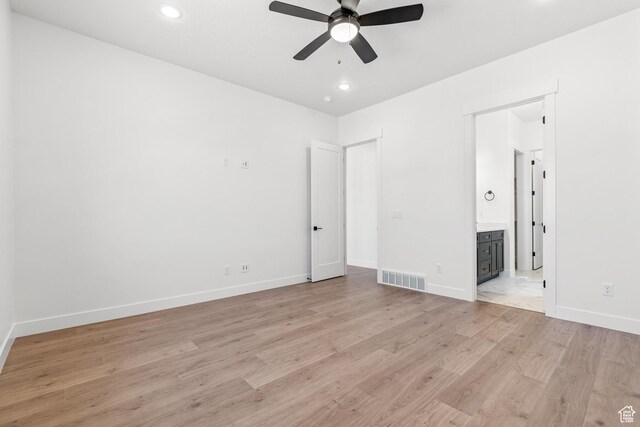 1226 Crest Dale Ln, Santaquin, UT 84655 - unfurnished bedroom featuring light wood-type flooring, ensuite bath, visible vents, recessed lighting, and baseboards