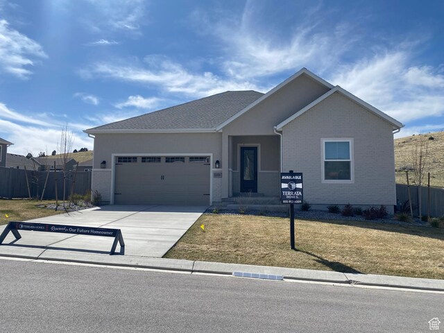 1226 Crest Dale Ln, Santaquin, UT 84655 - ranch-style house featuring a front yard, driveway, fence, and an attached garage