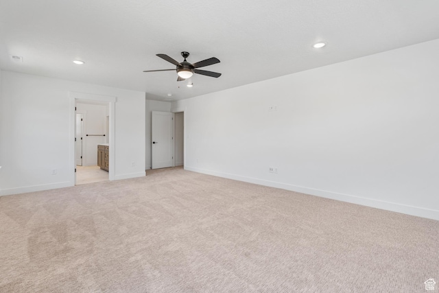 1263 Crest Dale Ln, Santaquin, UT 84655 - unfurnished bedroom featuring visible vents, baseboards, connected bathroom, recessed lighting, and light colored carpet