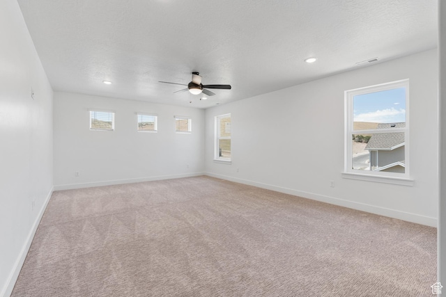 1263 Crest Dale Ln, Santaquin, UT 84655 - spare room with a ceiling fan, baseboards, light colored carpet, and visible vents
