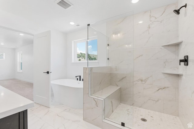 1263 Crest Dale Ln, Santaquin, UT 84655 - bathroom with a freestanding tub, visible vents, tiled shower, and marble finish floor