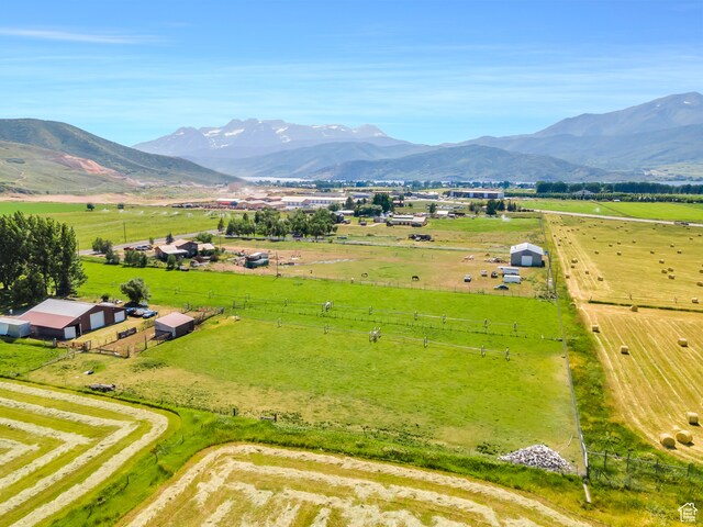 aerial view featuring a rural view and a mountain view