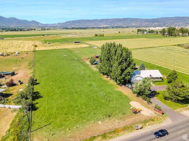 bird's eye view with a mountain view and a rural view