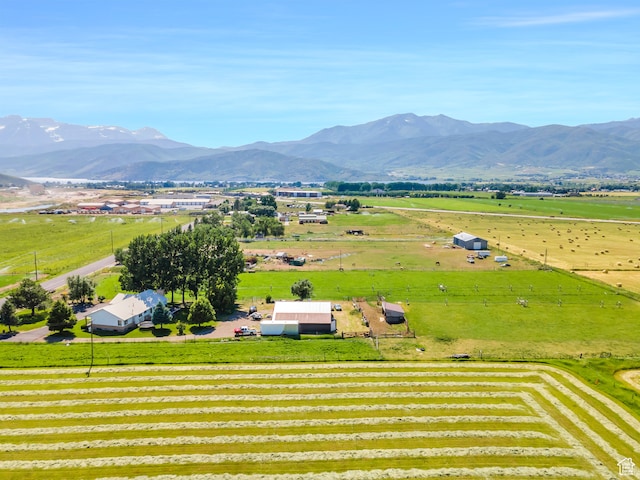 drone / aerial view featuring a rural view and a mountain view