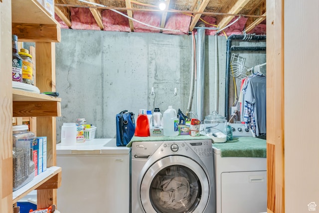 laundry area with washer and dryer