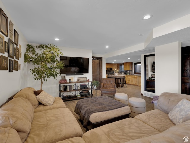 1271 E Oakridge Rd S, Park City, UT 84098 - living room with light wood finished floors, visible vents, and recessed lighting