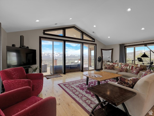 1271 E Oakridge Rd S, Park City, UT 84098 - living area with light wood-style flooring, a mountain view, vaulted ceiling, and recessed lighting