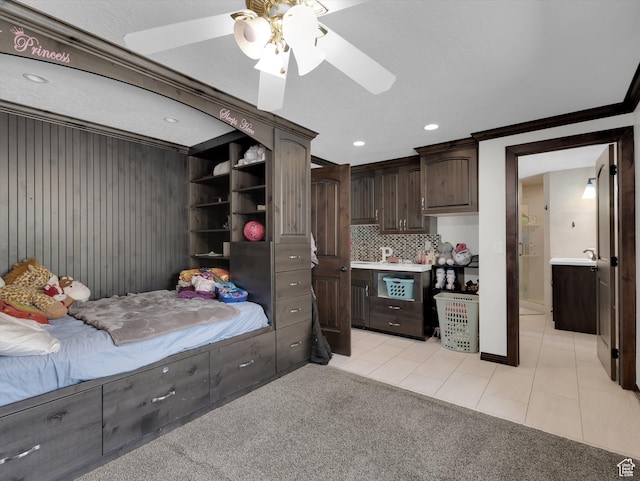 1271 E Oakridge Rd S, Park City, UT 84098 - bedroom with light tile patterned floors, recessed lighting, ornamental molding, and light colored carpet