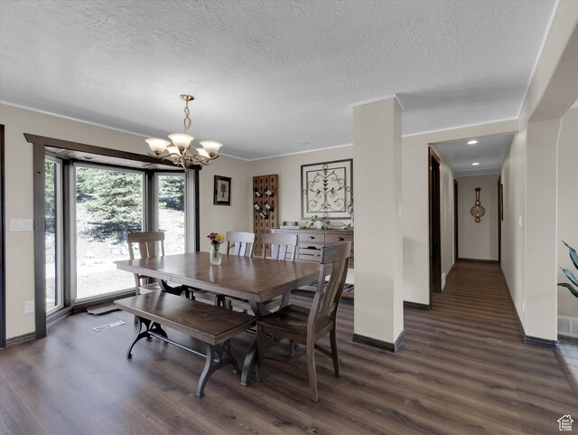 1271 E Oakridge Rd S, Park City, UT 84098 - dining room featuring dark wood-style floors, a textured ceiling, baseboards, and an inviting chandelier