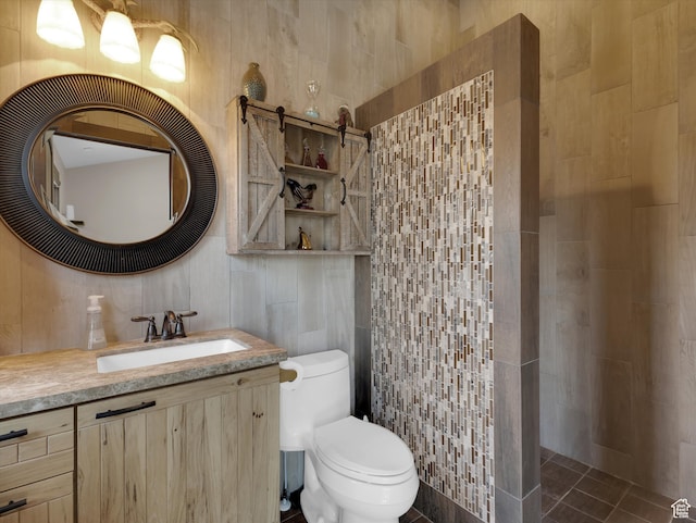 1271 E Oakridge Rd S, Park City, UT 84098 - full bathroom featuring tile patterned flooring, toilet, vanity, tile walls, and tiled shower